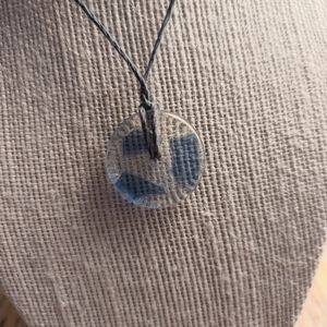 Sea glass pendant with hemp necklace